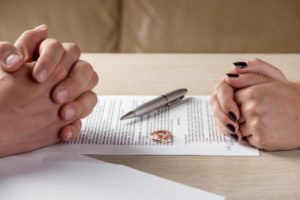 Marriage-agreements-with-two-hands-and-document